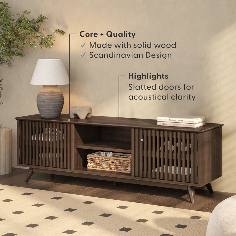 Scandinavian design solid wood media console with slatted doors for acoustical clarity in a modern living room.