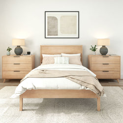 Modern bedroom with light wood furniture, neutral bedding, and minimalistic decor.