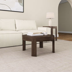 Stylish modern living room with white sofa, dark wood coffee table, beige rug, and soft ambient lighting.