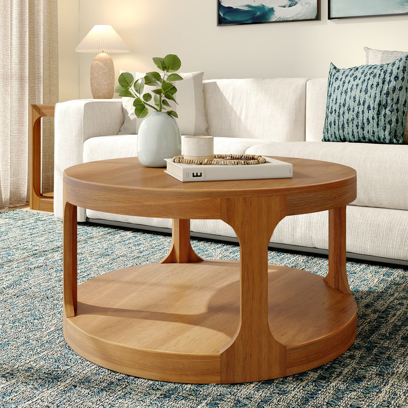Modern living room with round wooden coffee table, decorative vase, and cozy beige sofa.