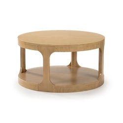 Round wooden coffee table with two-tier design in light brown finish for modern living room decor.