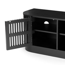 Modern black wooden media console TV stand with slatted hinged door open, interior shelving and rear cable management hole