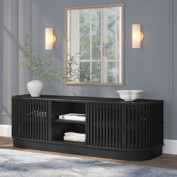 Black modern slatted entryway console cabinet with open shelves, framed wall mirror, twin wall sconces, white vase with greenery and decorative bowl — stylish hallway storage and decor