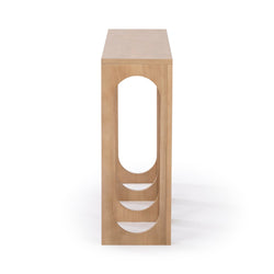 Minimalist wooden console table with a unique cutout design, side view.