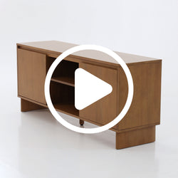 Mid-century modern teak wood media console TV stand with sliding doors, central open shelving and natural wood finish