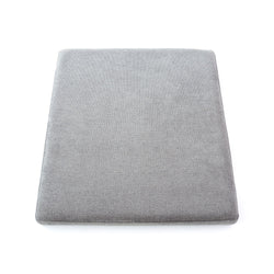 Gray foam cushion pad for ergonomic comfort and support on chairs.