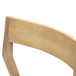 Close-up view of a wooden chair backrest, showcasing natural wood grain and smooth finish.