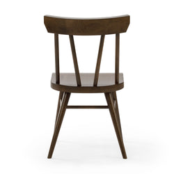 Brown wooden chair with a curved back and spindle design, perfect for dining room or office settings.