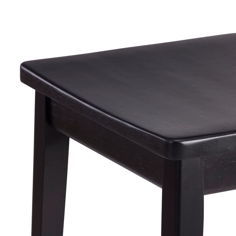 Close-up of a sleek, black wooden chair seat showing modern design and craftsmanship.