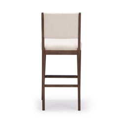 Tall wooden bar stool with beige cushioned seat and backrest, ideal for modern kitchen and dining decor.