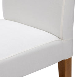 White upholstered dining chair with padded seat and high back, natural wood legs, modern minimalist design