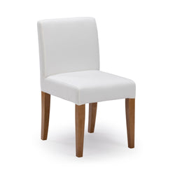 White upholstered Parsons dining chair with padded seat and tapered solid wood legs — modern accent chair for dining room or kitchen