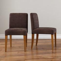 Set of 2 brown upholstered dining chairs with wooden legs on hardwood floor against a neutral wall, modern dining room chairs