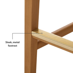 Wooden chair leg with sleek metal footrest attachment.