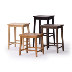 Set of four wooden bar stools in different colors and heights.