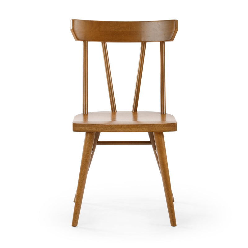 Wooden dining chair with spindle back design and natural finish.