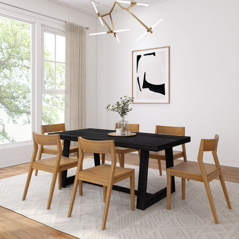 Modern dining room with black wooden table, natural wood chairs, abstract wall art, and stylish chandelier.