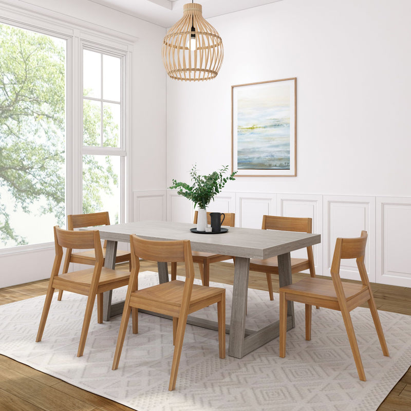 Modern dining room with wooden furniture and neutral decor.