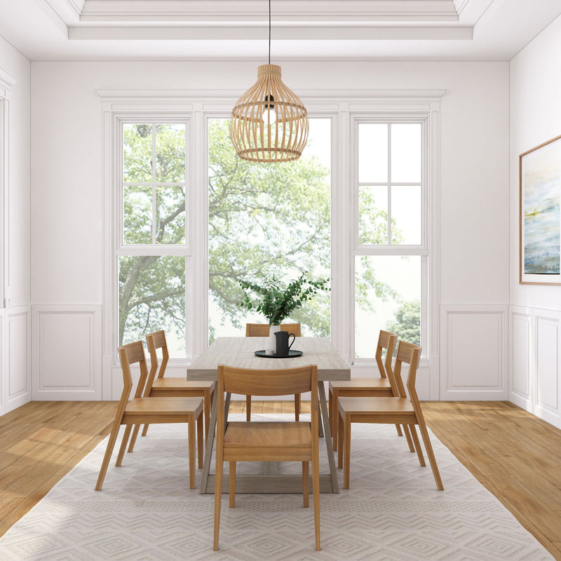 Modern dining room with wooden table and chairs, featuring large windows, a stylish pendant light, and a nature-inspired decor.
