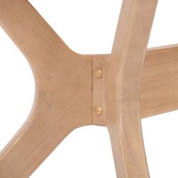 Close-up of a natural wood chair joint showcasing craftsmanship and design.