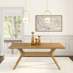 Modern dining room with a wooden table, decorative candles, pendant lights, and abstract wall art.