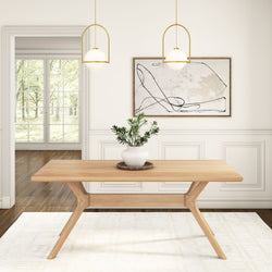 Modern dining room interior with minimalist wooden table, potted plant centerpiece, abstract wall art, and pendant lighting.