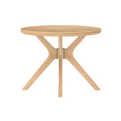 Elegant round wooden dining table with modern, minimalist design and sturdy legs.