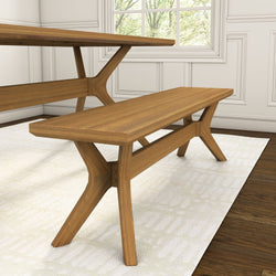 Modern wooden dining bench with cross-leg design in bright room, perfect for kitchen or dining area seating.