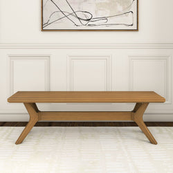 Mid-century modern wooden bench with unique leg design in a minimalist living room setting.