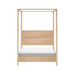 Minimalist natural oak four-poster canopy bed frame with platform base and mattress, modern wooden bedroom furniture