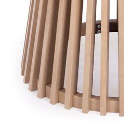 Wooden slatted table leg design in natural finish.