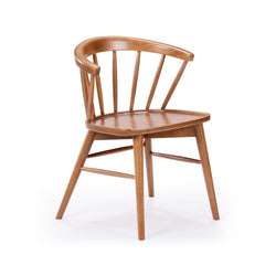 Wooden spindle-back chair with curved backrest and sleek design on white background.