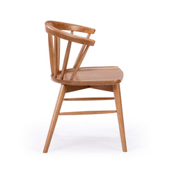 Mid-century modern wooden dining chair with spindle back and natural finish.