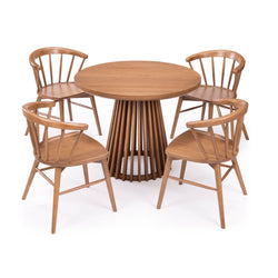Modern round wooden dining table set with four chairs for elegant home decor.