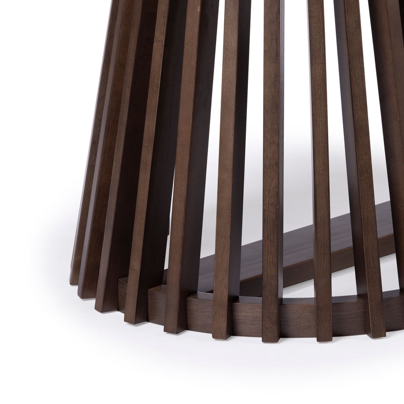 Close-up of dark walnut wooden slatted round table base with vertical slat pedestal, modern mid-century dining table design