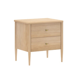 Mid-century modern nightstand in light oak finish with two drawers, brass knobs and tapered legs — bedside storage table