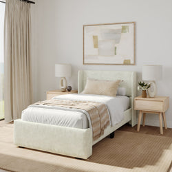 Modern bedroom interior design featuring a beige upholstered bed, minimalist bedside tables, and neutral decor with abstract wall art.