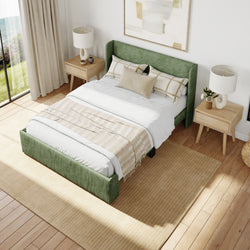 Elegant bedroom interior with green upholstered bed, modern wooden nightstands, and cozy bedding in a bright, natural light setting.