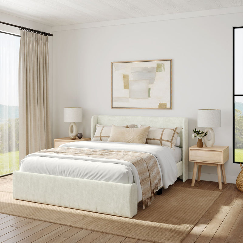 Modern bedroom interior with a cozy bed, neutral decor, and trendy furniture.