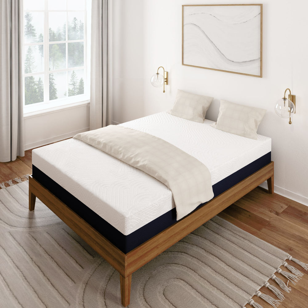 Minimalist bedroom with modern wooden bed frame, comfortable mattress, and cozy white bedding near a large window.