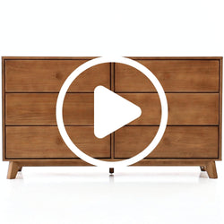 Mid-century modern six-drawer wooden dresser with video play icon overlay.