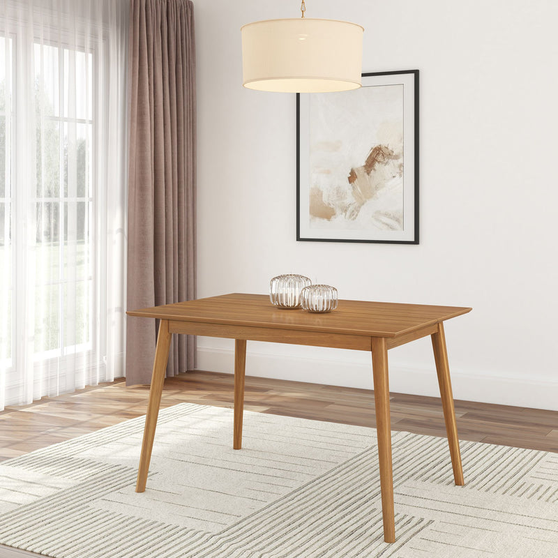 Modern wooden dining table in a bright minimalist dining room with natural light and elegant decor.