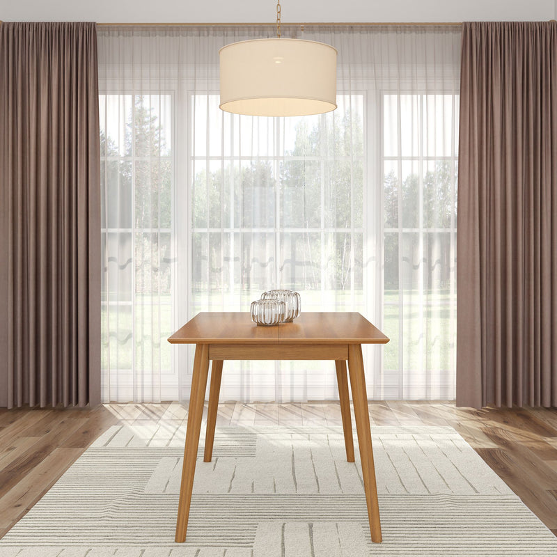 Modern dining room with wooden table, pendant light, large windows, and elegant curtains.