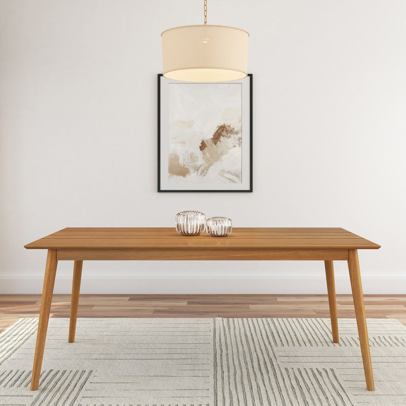 Modern wooden dining table with minimalist decor and abstract art in a contemporary living room.