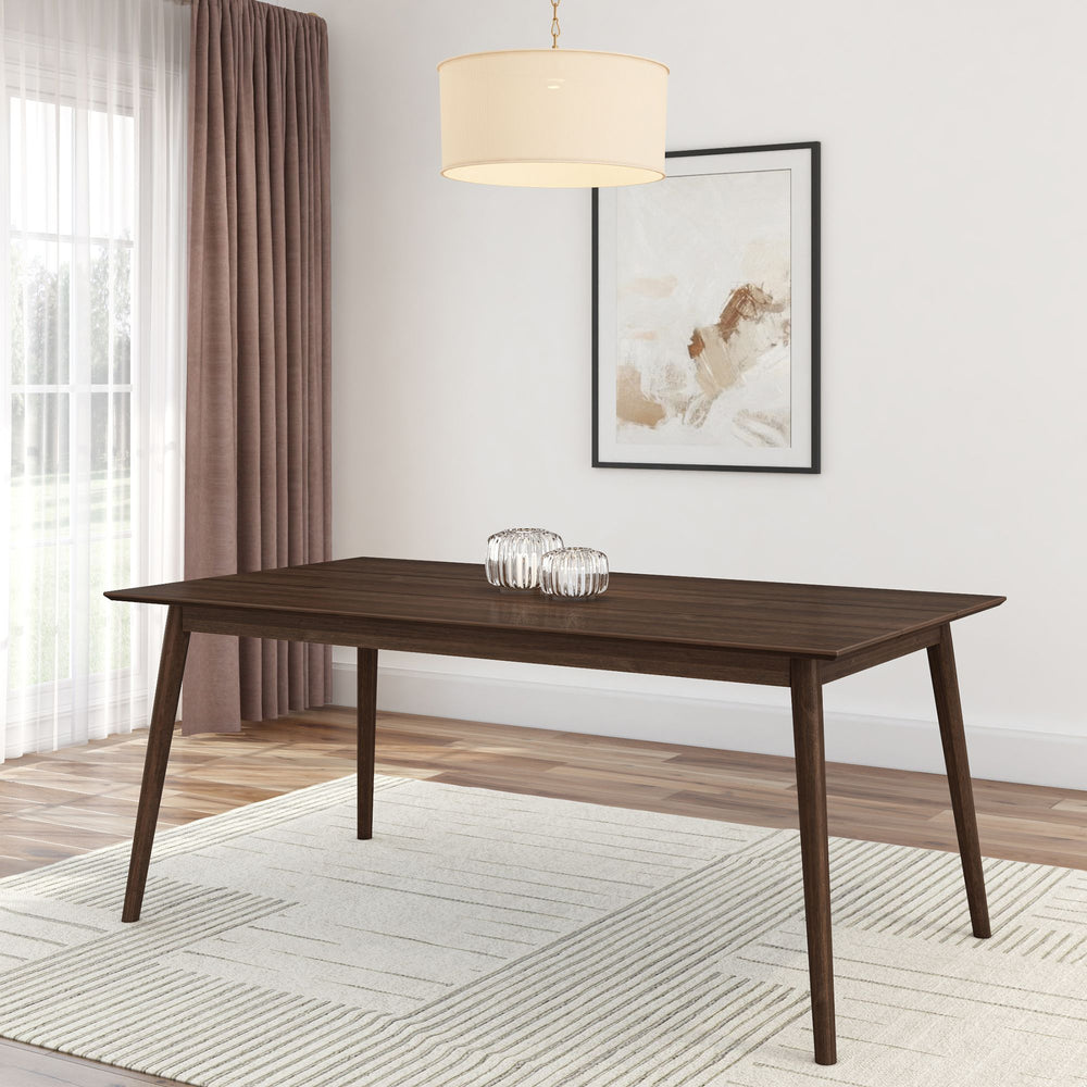 Modern dining room with a sleek wooden table, contemporary chandelier, and abstract wall art.