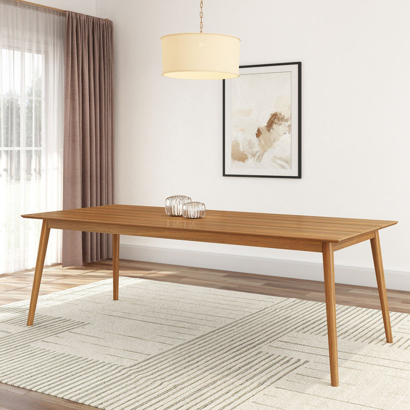 Modern wooden dining table in elegant room with minimalistic decor.