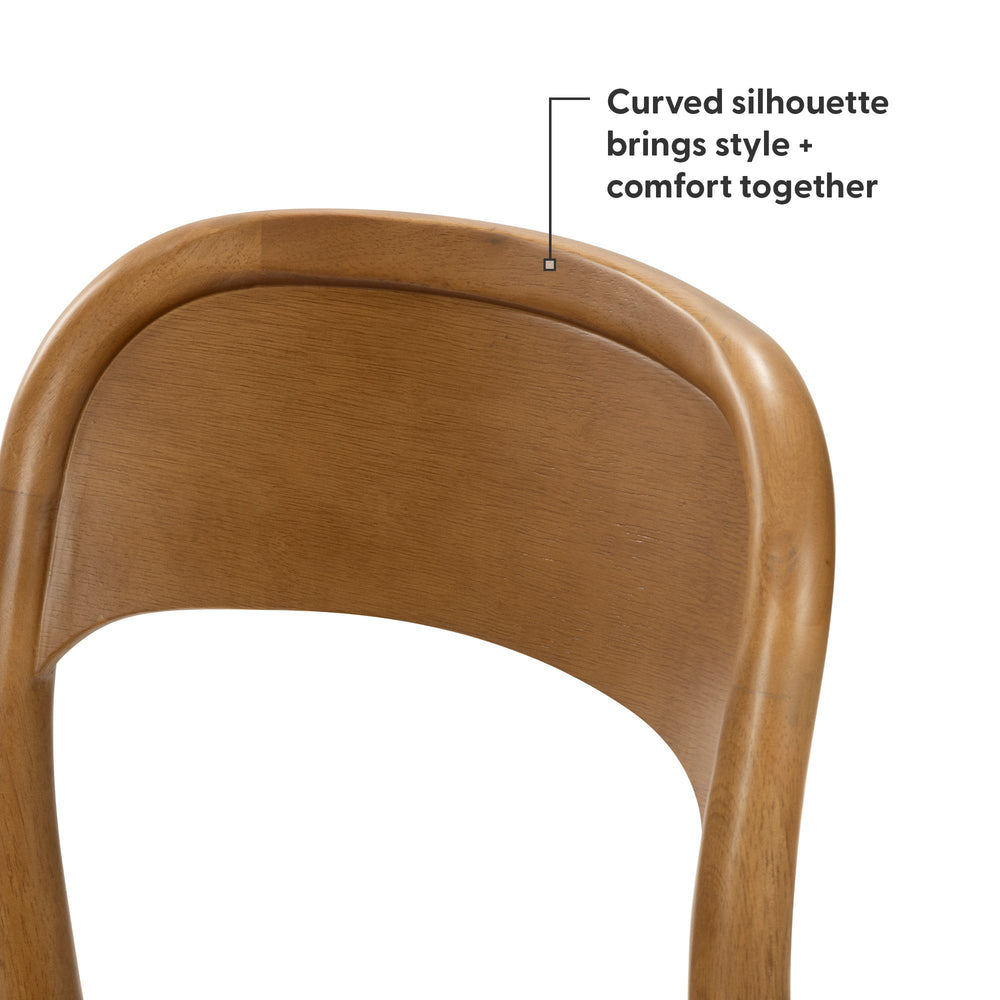 Curved wooden chair back with silhouette highlighting style and comfort.