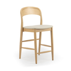 Mid-century modern light beech wood counter-height bar stool with cream upholstered padded seat and curved back for kitchen island or breakfast bar