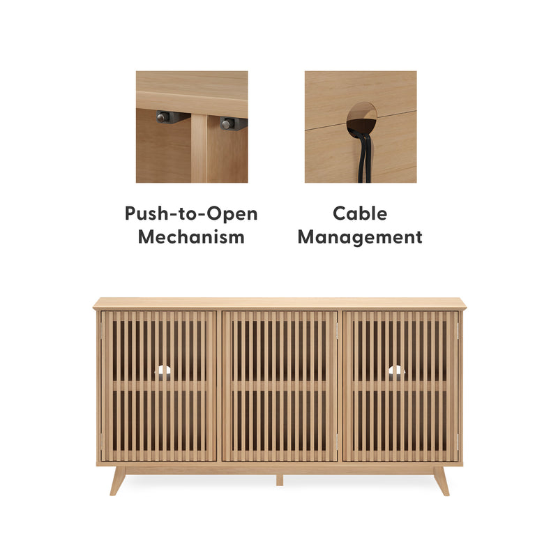 Mid-century modern light oak wooden TV media console with three slatted doors, push-to-open mechanism and rear cable-management holes