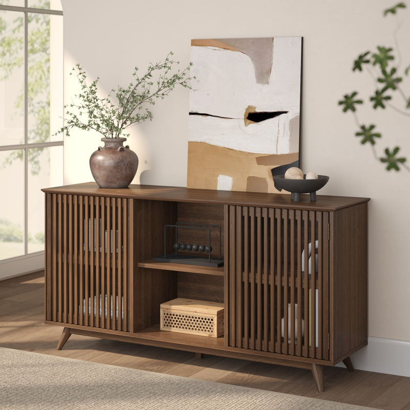 Stylish wooden sideboard with decorative vases and abstract wall art in a modern living room setting.